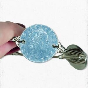 6031. Silvertone Faux Coin Wire Bracelet